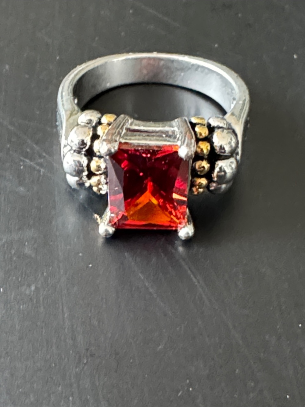 Silver Tone Ring with Red Garnet-Cut Center Stone